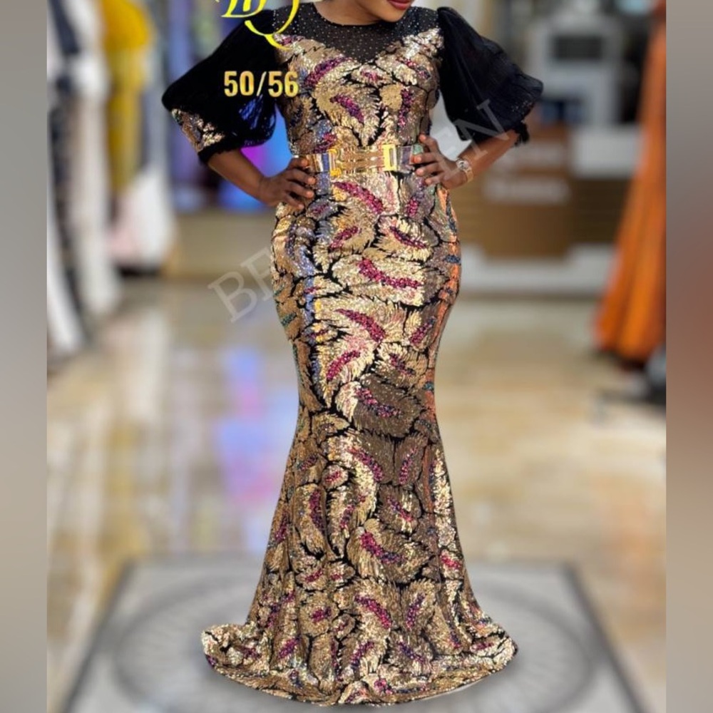 Plus size Sequence elegant dress with gold belt. New and in the boutique.